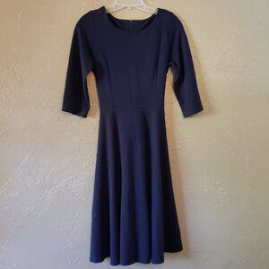Navy blue dress. size M.  Midi. New . Ties in back at waist